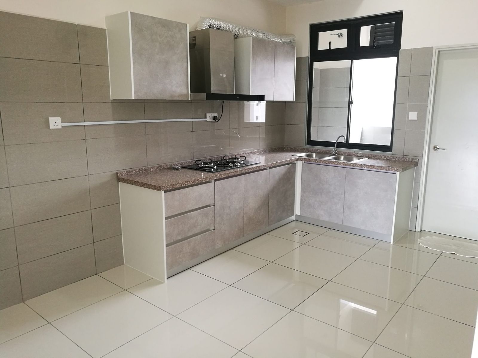 Built-in cabinets equipped with  cooker hood and gas stove.